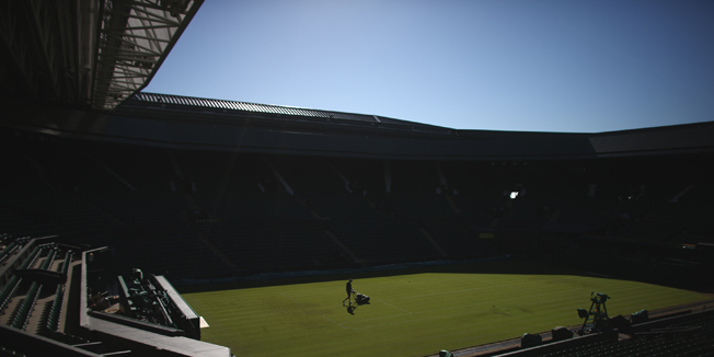 LONDON, ENGLAND - JUNE 30:  A member of the ground staff mows the grass on centre court on day two of Wimbledon tennis tournament on June 30, 2015 in London, England. The 129th tournament to be hosted at Wimbledon is due to run for two weeks from Monday 29th June.  (Photo by Carl Court/Getty Images)