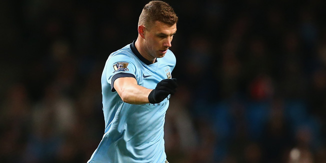 MANCHESTER, ENGLAND - FEBRUARY 21:  Edin Dzeko of Manchester City in action during the Barclays Premier League match between Manchester City and Newcastle United at Etihad Stadium on February 21, 2015 in Manchester, England.  (Photo by Clive Brunskill/Getty Images)