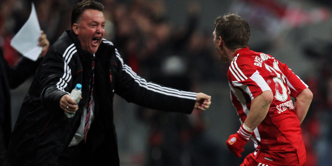MUNICH, GERMANY - OCTOBER 26:  Bastian Schweinsteiger (R) of Bayern Muenchen celebrates his second goal with team coach Louis van Gaal during the DFB Cup second round match between FC Bayern Muenchen and Werder Bremen on October 26, 2010 in Munich, Germany.  (Photo by Alexandra Beier/Bongarts/Getty Images)