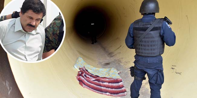 Federal policemen inspect a pipeline under construction by the Altiplano prison in Almoloya de Juarez, Mexico on July 12, 2015. Mexican drug lord Joaquin 