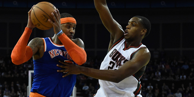 LONDON, ENGLAND - JANUARY 15:  Carmelo Anthony of New York Knicks finds his way blocked by  Khris Middleton of Milwaukee Bucks during the NBA match between New York Knicks and Milwaukee Bucks at O2 Arena on January 15, 2015 in London, England. NOTE TO USER: User expressly acknowledges and agrees that, by downloading and or using this photograph, User is consenting to the terms and conditions of the Getty Images License Agreement.  (Photo by Mike Hewitt/Getty Images)