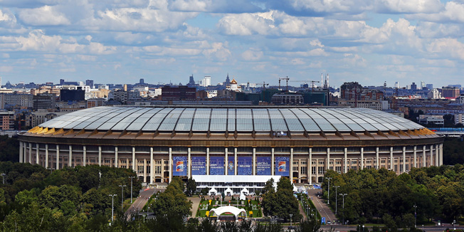 MOSCOW, RUSSIA - AUGUST 17:  Luzhniki Stadium and the Moscow skyline are seen from Lenin Hill on the campus of Lomonosov Moscow State University on August 17, 2013 in Moscow, Russia. The stadium, which is to be renovated after hosting the 14th IAAF World Athletics Championships Moscow 2013, is expected to host the 2018 World Cup Final.  (Photo by Michael Heiman/Getty Images)