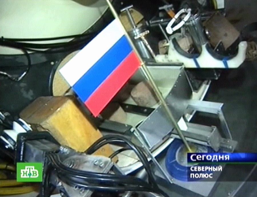FILES - This file Russian NTV channel TV grab taken on November 7, 2014 shows the Russian state flag fixed on board of the Mir-1mini-submarine as it dives into the water of Arctic Ocean, on August 2, 2007. Russia pressed a claim at the United Nations on August 4, 2015 for an additional 1.2 million square kilometres (463,000 square miles) of Arctic shelf, stepping up an international race for the region's vast energy reserves. In a submission to back a 2001 claim at the UN Commission on the Limits of the Continental Shelf, Russia said research showed it had rights over the swathe -- an area the size of South Africa. AFP PHOTO / NTVRESTRICTED TO EDITORIAL USE - MANDATORY CREDIT 