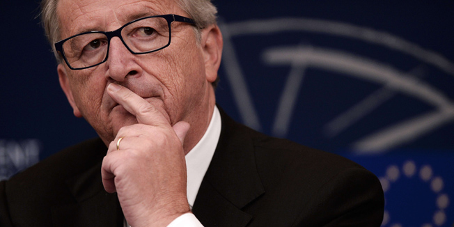 (FILES) - A file picture taken on October 22, 2014 shows the EU's incoming chief of commission Jean-Claude Juncker gestures during a press conference at the European Parliament in Strasbourg, eastern France. The EU is already probing Luxembourg's tax breaks for global firms and will take action if necessary, a spokesman for new European commission chief Jean-Claude Juncker said on November 6, 2014 after leaked documents on the deals were published.  AFP PHOTO/FREDERICK FLORIN