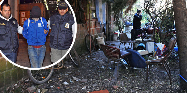 Handout photo released by La Capital de Mar del Plata newspaper of the house of Argentinian Eduardo Oviedo, where he kept his wife and autistic son locked in a cage in Mar del Plata, Buenos Aires province, on September 5, 2015. The man kept his wife, 61, and son, 32, locked for years and forced the son to eat dog food and breathe gasoline fumes, a judicial source said Saturday. Inside the cage, made of bricks, wood and metal bars, bags of human excrement lay on the ground, as did dog food, used syringes, gasoline cans, locks, chains and rope which he apparently used to tie them up. AFP PHOTO / Diario La Capital Mar del Plata - Mauricio Arduin