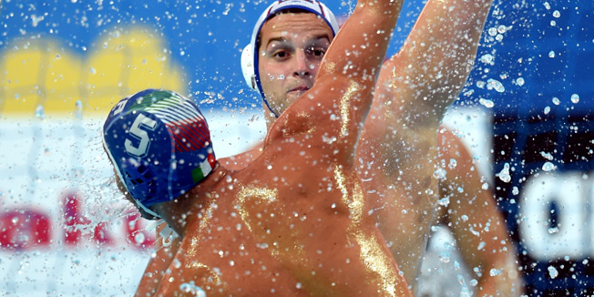 KAZAN, RUSSIA - JULY 29:  Alex Giorgetti #5 of Italy takes a shot against Vladislav Timakov #7 of Russia in the Men's Water Polo Preliminary Round Group B match between Russia and Italy on day five of the 16th FINA World Championships at the Water Polo Arena on July 29, 2015 in Kazan, Russia.  (Photo by Matthias Hangst/Getty Images)