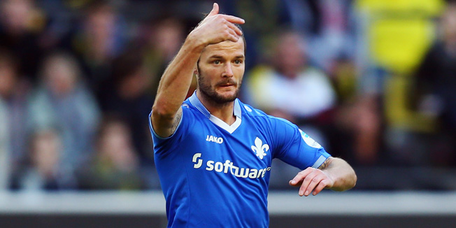 DORTMUND, GERMANY - SEPTEMBER 27:  Marcel Heller of Darmstadt celebrates his team's first goal during the Bundesliga match between Borussia Dortmund and SV Darmstadt 98 at Signal Iduna Park on September 27, 2015 in Dortmund, Germany.  (Photo by Alex Grimm/Bongarts/Getty Images)