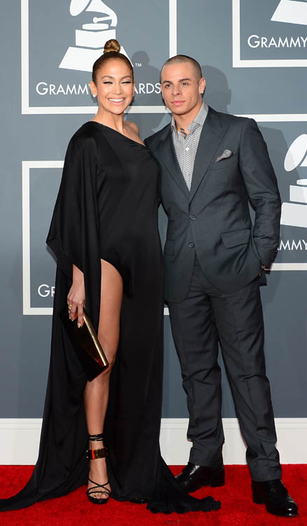 Jennifer Lopez and Casper Smart arrive on the red carpet at the Staples Center for the 55th Grammy Awards in Los Angeles, California, February 10, 2013. AFP PHOTO Frederic J. BROWN