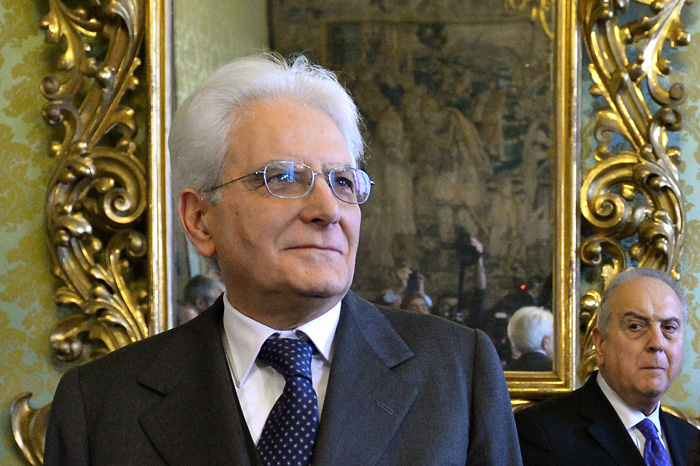 Newly elected President of Italy, Sicilian judge Sergio Mattarella looks on as he arrives at the Constitutional Council in Rome, on January 31, 2015. Renzi's backing for Mattarella has been interpreted as the end of a temporary alliance the premier forged with disgraced former prime minister Silvio Berlusconi to help drive labour market and electoral reforms through parliament. Mattarella is seen as an 