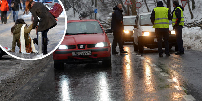Zagreb, 020214.Sljemenska cesta.Zbog poledice i kise koja se ledi na cesti zatvorena je Sljemenska cesta.Mnogi Zagrepcani koji su se uputili na snjezne radosti svojim automobilima primorani su se vratiti kucama.Na fotografiji: Guzva automobila.Foto: Goran Mehkek / CROIX