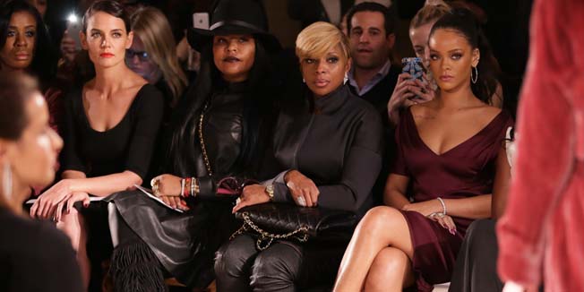 NEW YORK, NY - FEBRUARY 16: (L-R) Actresses Uzo Aduba, Katie Holmes, a guest, singer Mary J. Blige and singer Rihanna attend the Zac Posen fashion show at Vanderbilt Hall at Grand Central Terminal on February 16, 2015 in New York City.   Chelsea Lauren/Getty Images/AFP== FOR NEWSPAPERS, INTERNET, TELCOS & TELEVISION USE ONLY ==