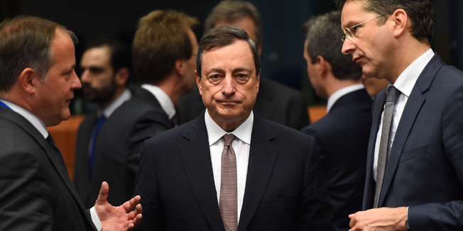 Eurogroup President and Dutch Finance Minister Jeroen Dijsselbloem (R) speaks before European Central Bank President Mario Draghi (C) on March 9, 2015 during a meeting of Eurogroup finance ministers at EU headquarters in Brussels. European finance ministers urged Greece to stop wasting time in talks on its crucial bailout as debt-stricken Athens warned of a possible referendum if its reform plans are rejected. Dijsselbloem said Greece had to make concrete progress if it wanted financial aid to be extended through the summer. Greek Finance Minister Yaris Varoufakis was presenting Athens's latest plans for reforms at the meeting in Brussels, which among other steps include using tourists as amateur sleuths to crack down on tax dodgers.     AFP PHOTO / EMMANUEL DUNAND