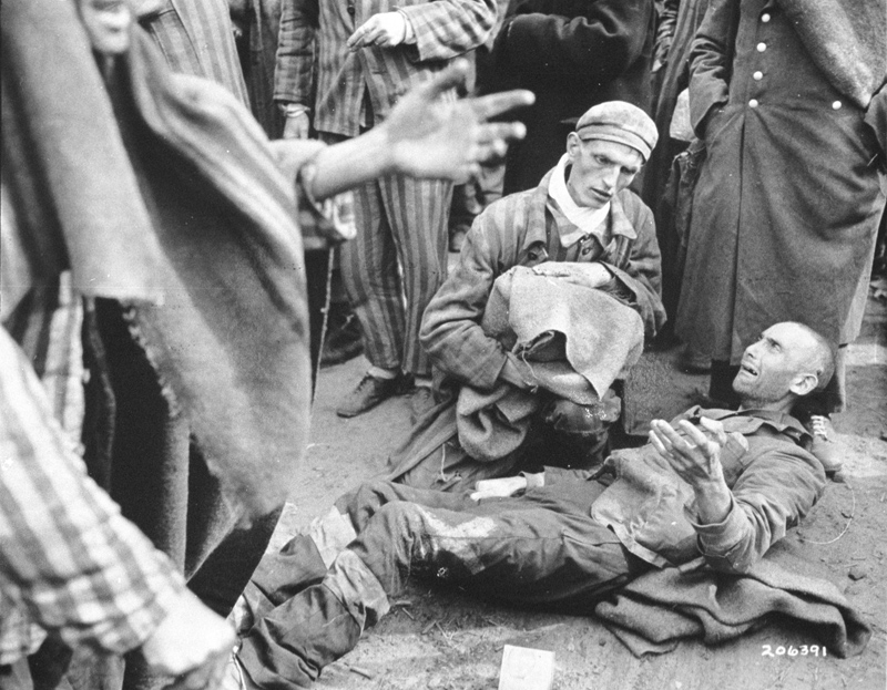 37723407: FILE PHOTO: An inmate breaks out in tears as he finds out he is not leaving with the first group to the hospital May 4, 1945 after the U.S. liberation troops entered the concentration camp at Wobbelin in Germany. Many inmates were found in pitiful condition. (Courtesy of the National Archives/Newsmakers)