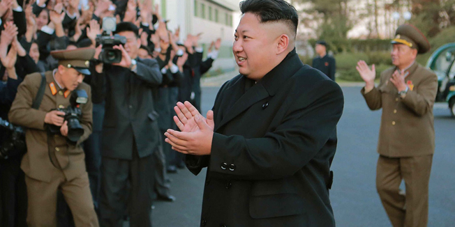 This undated photo released by North Korea's official Korean Central News Agency (KCNA) on November 15, 2014 shows North Korean leader Kim Jong-Un (front R) visiting the February 20 Factory of the Korean People's Army which produces foodstuff for servicemen, at an undisclosed location. Meanwhile, North Korea on November 15 warned of retaliatory strikes days after South Korea fired warning shots at a North Korean patrol near the border.      REPUBLIC OF KOREA OUT    AFP PHOTO / KCNA via KNS        THIS PICTURE WAS MADE AVAILABLE BY A THIRD PARTY. AFP CAN NOT INDEPENDENTLY VERIFY THE AUTHENTICITY, LOCATION, DATE, AND CONTENT  OF THIS IMAGE. THIS PHOTO IS DISTRIBUTED EXACTLY AS RECEIVED BY AFP.  ---EDITORS NOTE--- RESTRICTED TO EDITORIAL USE - MANDATORY CREDIT 
