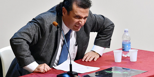 Costa Concordia's captain Francesco Schettino  attends for the resumption of his trial on December 2, 2014 in a local theatre in Grosseto. Captain Francesco Schettino, dubbed Italy's 