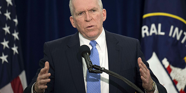 Director of Central Intelligence Agency John Brennan takes questions from reporters during a press conference at CIA headquarters in McLean, Virginia, December 11, 2014.   The head of the Central Intelligence Agency acknowledged Thursday some agency interrogators used 