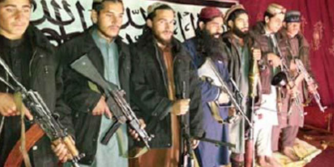This undated handout photograph taken in an undisclosed location, released by the Tehrik-i-Taliban Pakistan (TTP) and received on December 17, 2014 shows Taliban fighters who allegedly stormed an army-run school in Peshawar. Pakistan began three days of mourning on December 17 for the 132 schoolchildren and nine staff killed by the Taliban in the country's deadliest ever terror attack as the world united in a chorus of revulsion.    AFP PHOTO / Tehrik-i-Taliban Pakistan     ---------EDITORS NOTE---- RESTRICTED TO EDITORIAL USE - MANDATORY CREDIT  - 