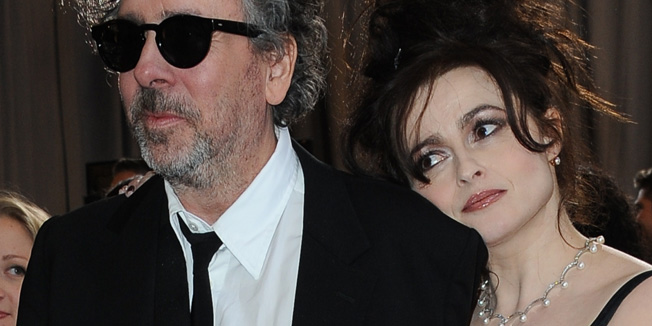 (FILES) - File picture taken February 24, 2013 shows Best Animated Feature Film nominee Tim Burton arriving with actress Helena Bonham Carter for the 85th Annual Academy Awards in Hollywood, California. Burton and his long-time actress partner Bonham Carter have separated after 13 years together, a spokeswoman confirmed December 23, 2014. A representative for Bonham Carter, the star of the 