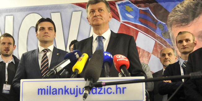 Zagreb, 281214. Izborni stozer Milana Kujundzica, Folnegoviceva 6.Pracenje rezultata prvog kruga predsjednickih izbora u stozeru predsjednickog kandidata Milana Kujundzica.Na fotografiji: obracanje Milana Kujundzica novinarima.Foto: Bruno Konjevic / CROPIX