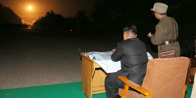 This undated picture released from North Korea's official Korean Central News Agency (KCNA) on July 10, 2014 shows North Korean leader Kim Jong-Un inspecting the tactical rocket firing drill of the units of the Korean People's Army (KPA) Strategic Force in the western sector of the  front.   AFP PHOTO / KCNA via KNS    REPUBLIC OF KOREA OUT   THIS PICTURE WAS MADE AVAILABLE BY A THIRD PARTY. AFP CAN NOT INDEPENDENTLY VERIFY THE AUTHENTICITY, LOCATION, DATE AND CONTENT OF THIS IMAGE. THIS PHOTO IS DISTRIBUTED EXACTLY AS RECEIVED BY AFP    ---EDITORS NOTE--- RESTRICTED TO EDITORIAL USE - MANDATORY CREDIT 