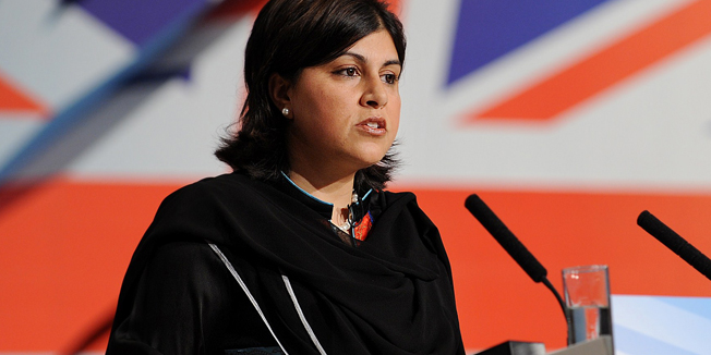 (FILES) A file picture taken on October 3, 2010, in Birmingham, central England, shows then Chairman of the Conservative Party, Sayeeda Warsi delivering a speech. A British minister who was the first Muslim woman to sit in the Cabinet has resigned over the British government's policy on Gaza, she said Tuesday August 5, 2014.  AFP PHOTO / BEN STANSALL/FILES