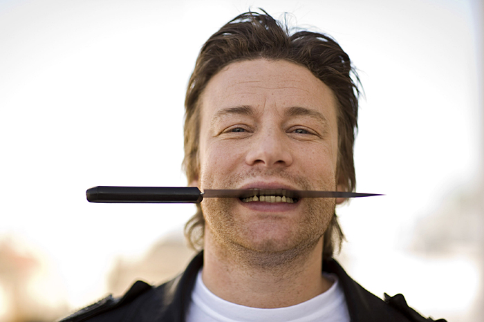 British celebrity Chef Jamie Oliver poses for photographers during at the Dussmann bookshop in Berlin on October 19, 2009. Oliver is in Berlin to promote his latest book 