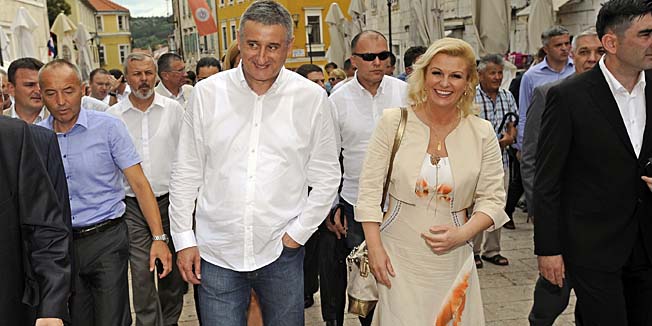 Sinj, 030814.Uoci 299. Sinjske alke u Sinj su dosli mnogobrojni nasi politicari i javne osobe.Na fotografiji: Tomislav Karamarko i Kolinda Grabar Kitarovic.Foto: Nikola Vilic  / CROPIX