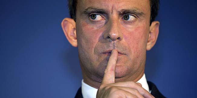 (FILES) -- A file picture shows then French Interior minister Manuel Valls gesturing as he attends a ceremony at the site of the future European Centre of Judaism on September 10, 2013 in Paris. French President Francois Hollande asked French Prime Minister Manuel Valls to form a new government, 