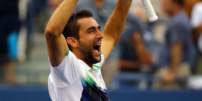 NEW YORK, NY - SEPTEMBER 06: Marin Cilic of Croatia celebrates after defeating Roger Federer of Switzerland during their men's singles semifinal match on Day Thirteen of the 2014 US Open at the USTA Billie Jean King National Tennis Center on September 6, 2014 in the Flushing neighborhood of the Queens borough of New York City. Cilic defeated Federer in three sets 6-3, 6-4, 6-4.   Al Bello/Getty Images/AFP== FOR NEWSPAPERS, INTERNET, TELCOS & TELEVISION USE ONLY ==