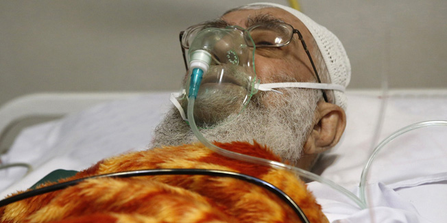 This handout photo provided by the official website of The Center for Preserving and Publishing the Works of Iran's supreme leader, Ayatollah Ali Khamenei, shows him after his prostate operation at a hospital in Tehran on September 8, 2014. Ali Khamenei, 75, successfully underwent prostate surgery it was announced, in an unprecedented public statement about his health, which has long been the subject of speculation. AFP PHOTO/HO/KHAMENEI.IR == RESTRICTED TO EDITORIAL USE - MANDATORY CREDIT - 