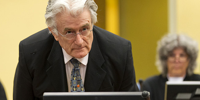 Bosnian Serb wartime leader Radovan Karadzic appears in the courtroom for his appeals judgement at the International Criminal Tribunal for Former Yugoslavia (ICTY) in The Hague, The Netherlands, on July 11 2013. AFP PHOTO/ POOL/MICHAEL KOOREN