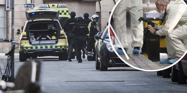 Police investigates on September 16, 2014 at a shooting scene at the civil court authorities in Hestemoellestraede. One person was killed and one wounded. Alleged offender is arrested. The two affected individuals are respectively a family member and a person who had professional errand in court.  AFP PHOTO / Scanpix Denmark / SIMON SKIPPER / Denamark Out
