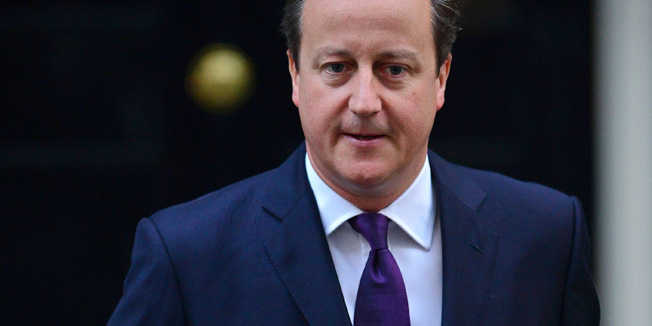 British Prime Minister David Cameron prepares to address the media outside 10 Downing Street in London, on September 19, 2014, following results in the Scottish referendum on independence. Scotland's First Minister Alex Salmond on Friday conceded defeat in his party's campaign for independence from the rest of the United Kingdom, after all but one result from the historic referendum was declared.  AFP PHOTO / CARL COURT