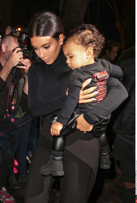 Kim Kardashian (L) and her daughter North West (R) arrive at the Balenciaga show as part of Paris Fashion Week Womenswear Spring/Summer 2015. Paris, FRANCE - September 24, 2014/PLV_KK_VU008/Credit:LAURENTVU/SIPA/1409250044 *** Local Caption *** 00693481