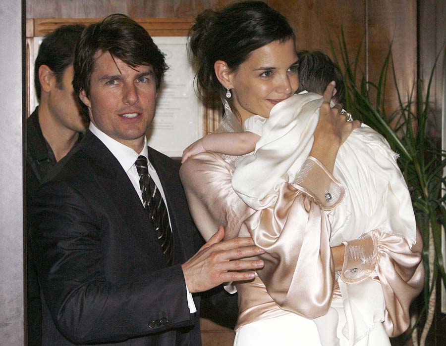 FILE - In this Nov. 17, 2006 file photo, U.S. actor Tom Cruise, and U.S. actress Katie Holmes with their daughter Suri, who became engaged in June 2005, leave a restaurant in Rome. Cruise and Homes are calling it quits after five years of marriage. Holmes' attorney Jonathan Wolfe said Friday June 29, 2012 that the couple is divorcing, but called it a private matter for the family. (AP Photo/Alessandra Tarantino, File)