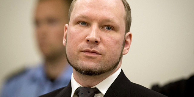 (FILES) A picture taken on August 24, 2012 shows self-confessed mass murderer Anders Behring Breivik arriving in court room 250 at the central court Oslo to be sentenced for his twin attacks last year that left 77 people dead, bringing to a close one of the most spectacular trials in Norway's history. Norwegian mass killer Anders Behring Breivik has said he wants to study political science at the University of Oslo, the institution said on July 30, 2013. AFP PHOTO / ODD ANDERSEN