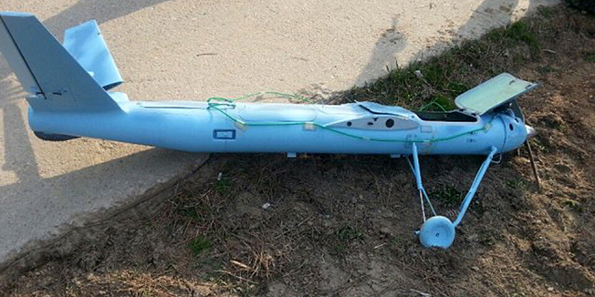 This picture released on April 2, 2014 shows wreckage of a crashed drone found on March 31, 2014 at Baengnyeong island near the disputed waters of the Yellow Sea. South Korea said it had recovered an unidentified drone that crashed on one of its border islands the same day that North and South Korea exchanged artillery fire across their disputed maritime boundary.  AFP PHOTO / South Korean Defence Ministry             ---- EDITORS NOTE ---- RESTRICTED TO EDITORIAL USE   MANDATORY CREDIT 