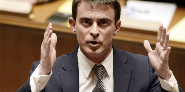 France's newly appointed Prime minister Manuel Valls addresses members of the parliament after delivering his domestic policy speech, on April 8, 2014 at the French national assembly in Paris. The speech will determine the future direction of the  country, followed by a vote of confidence.  AFP PHOTO / ERIC FEFERBERG