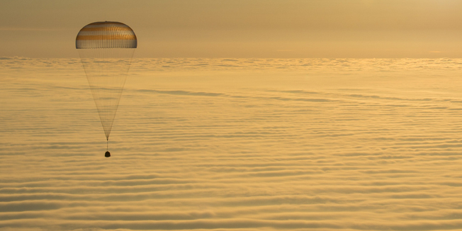 The Soyuz TMA-14M spacecraft is seen as it lands with Expedition 42 commander Barry Wilmore of NASA, Alexander Samokutyaev of the Russian Federal Space Agency (Roscosmos) and Elena Serova of Roscosmos near the town of Zhezkazgan, Kazakhstan on Thursday, March 12, 2015. NASA Astronaut Wilmore, Russian Cosmonauts Samokutyaev and Serova are returning after almost six months onboard the International Space Station where they served as members of the Expedition 41 and 42 crews.   AFP PHOTO / NASA / BILL INGALLS    == RESTRICTED TO EDITORIAL  USE / MANDATORY CREDIT:  