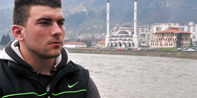 22-year-old Bosnian Alen Muhic poses during an interview in Gorazde on March 27, 2015, after the premierre of the documentary film 