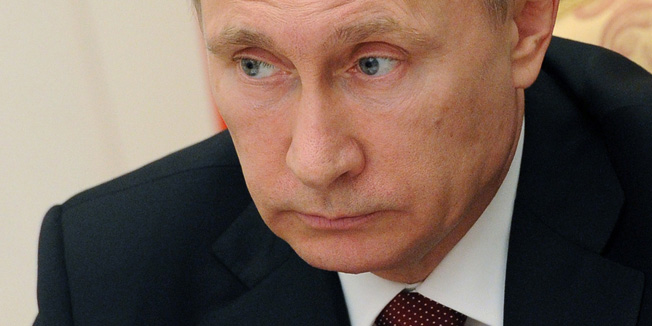 Russian President Vladimir Putin chairs a meeting with the government at the Kremlin in Moscow on March 25, 2015. AFP PHOTO / RIA NOVOSTI / MIKHAIL KLIMENTYEV