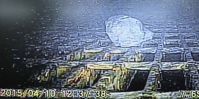This handout picture taken by Tokyo Electric Power Co. (TEPCO) on April 10, 2015 shows an image taken by a remote control robot inside the reactor vessel of the unit one building at TEPCO's Fukushima Dai-ichi nuclear power plant at Okuma in Fukushima prefecture. The remote-control survey robot stopped functioning inside the damaged reactor vessel during the mission but the robot recorded captured images and collected data, including on radiation levels inside the vessel.   AFP PHOTO / TEPCO ---EDITORS NOTE---HANDOUT RESTRICTED TO EDITORIAL USE - MANDATORY CREDIT 
