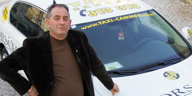 Rijeka, 150210.Kosta Minovski vlasnik firme Cammeo taxi pokraj automobila Skoda Superb sa kojima ce poslovati po Zagrebu.Foto: Zeljko Sop / CROPIX