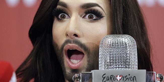 Eurovision Song Contest 2014 winner Conchita Wurst representing Austria addresses a press conference after arriving from Denmark at Schwechat airport near Vienna on May 11, 2014, one day after the contest's Grand Final. Austria won this year's Eurovision Song Contest with 
