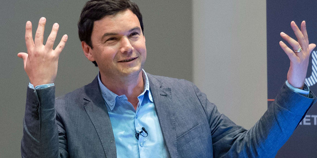 French economist Thomas Piketty speaks to students and guests during a presentation at King's College, central London, on April 30, 2014. Piketty said that he hoped to create a 