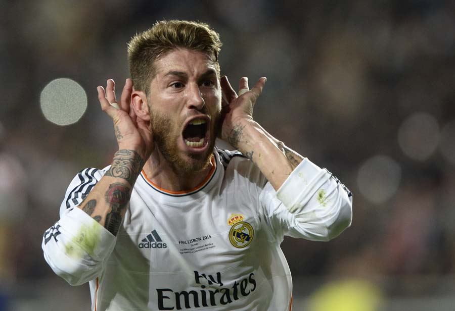TOPSHOTSReal Madrid's defender Sergio Ramos celebrates after scoring during the UEFA Champions League Final Real Madrid vs Atletico de Madrid at Luz stadium in Lisbon, on May 24, 2014.   AFP PHOTO/ FRANCK FIFE