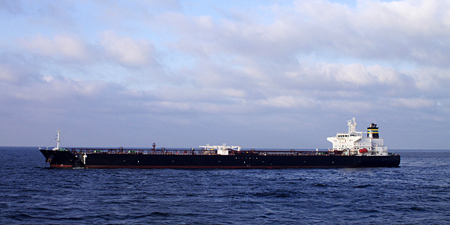 In this image released by the Dutch Coastguard, the damaged Greek tanker, Mindoro, is seen after colliding with a container ship 30 kilometers (20 miles) off the Dutch coast, Tuesday Oct. 12, 2010. The tanker briefly leaked jet fuel into the North Sea, a Coast Guard spokesman said but the crew was able to pump the remaining fuel into an undamaged part of the ship, ending the leak. (AP Photo/Dutch Coastguard)