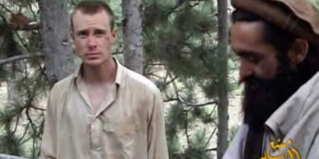This still image provided on December 7, 2010 by IntelCenter shows the Taliban associated video production group Manba al-Jihad December 7, 2010 release of US Sergeant Bowe Bergdahl (L), who has been held hostage by the Taliban since his disappearance from his unit on June 30, 2009. Also with him in this clip appears to be Taliban commander Maulawi Sangin (R). US President Barack Obama said on May 31, 2014, that Bergdahl held for half a decade in Afghanistan has been freed. 