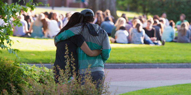 SEATTLE, WA - JUNE 05: Students mourn on campus after a shooting at Seattle Pacific University on June 5, 2014 in Seattle, Washington. A gunman is in custody after four people were shot on campus resulting in one death.   Mat Hayward/Getty Images/AFP== FOR NEWSPAPERS, INTERNET, TELCOS & TELEVISION USE ONLY ==