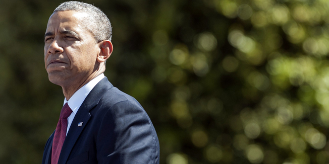 US President Barack Obama speaks during the 70th French-American Commemoration D-Day Ceremony at the Normandy American Cemetery and Memorial in Colleville-sur-Mer, Normandy, on June 6, 2014. Leaders and dignitaries from around the world traveled to attend events commemorating the June 6, 1944 Allied landings on the beaches of Normandy during World War II.  AFP PHOTO / Saul LOEB